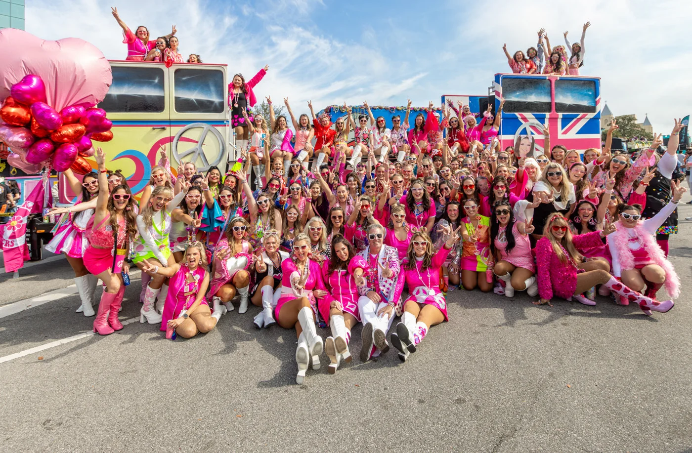 The Krewe of Hip Huggers gathered in colorful outfits at the 2026 Mardi Gras parade